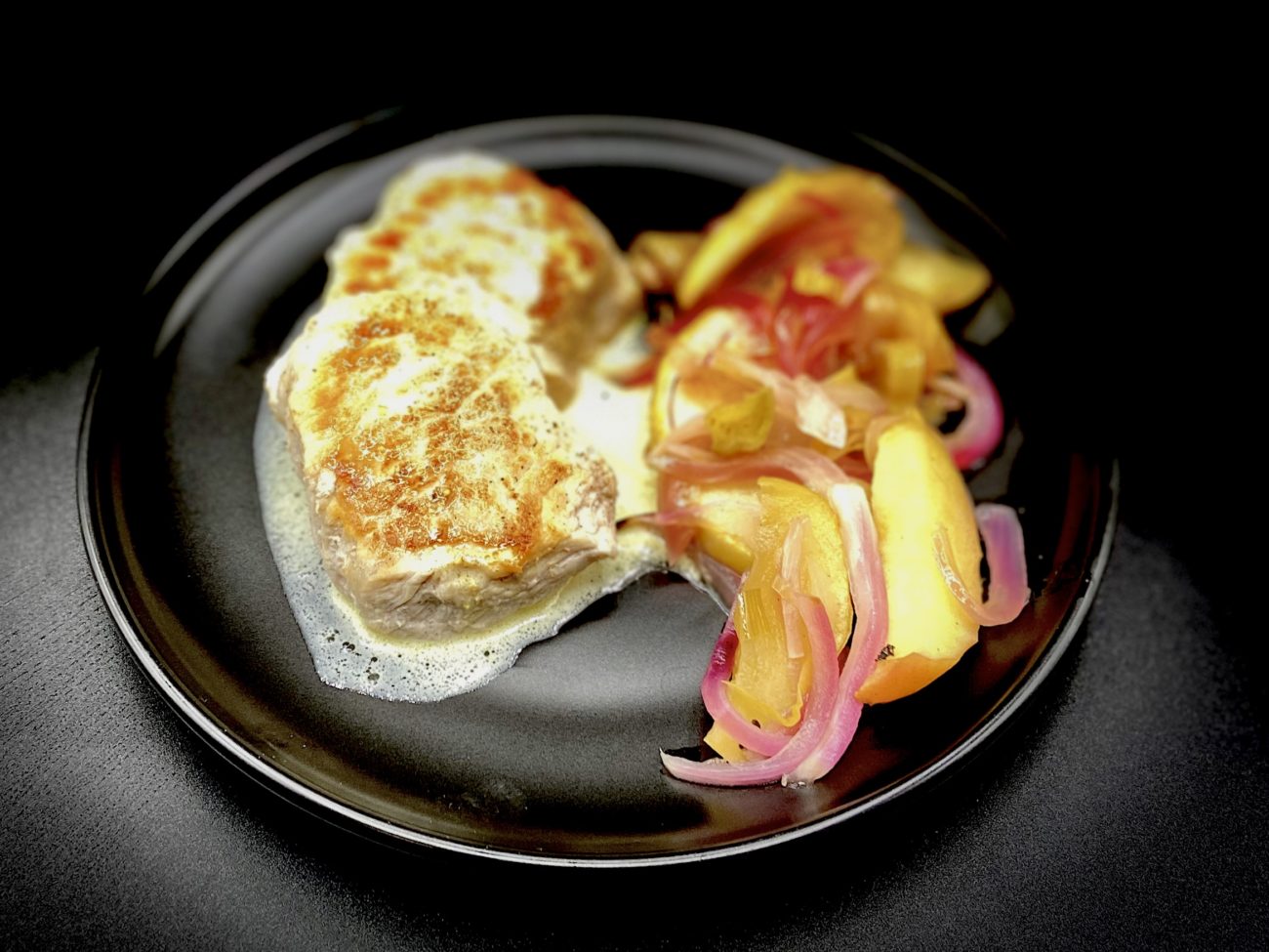 Sage Pork Medallions with Roasted Apples, Leeks and Onions Served with Sage Cream Sauce