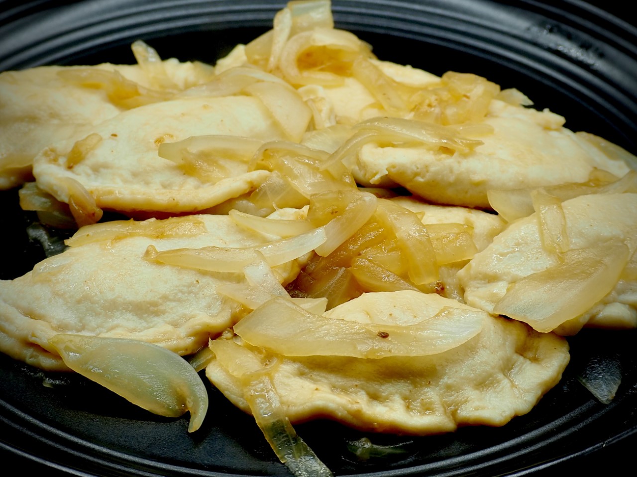 Homemade Potato and Cheddar Cheese Pierogies with Caramelized Onions
