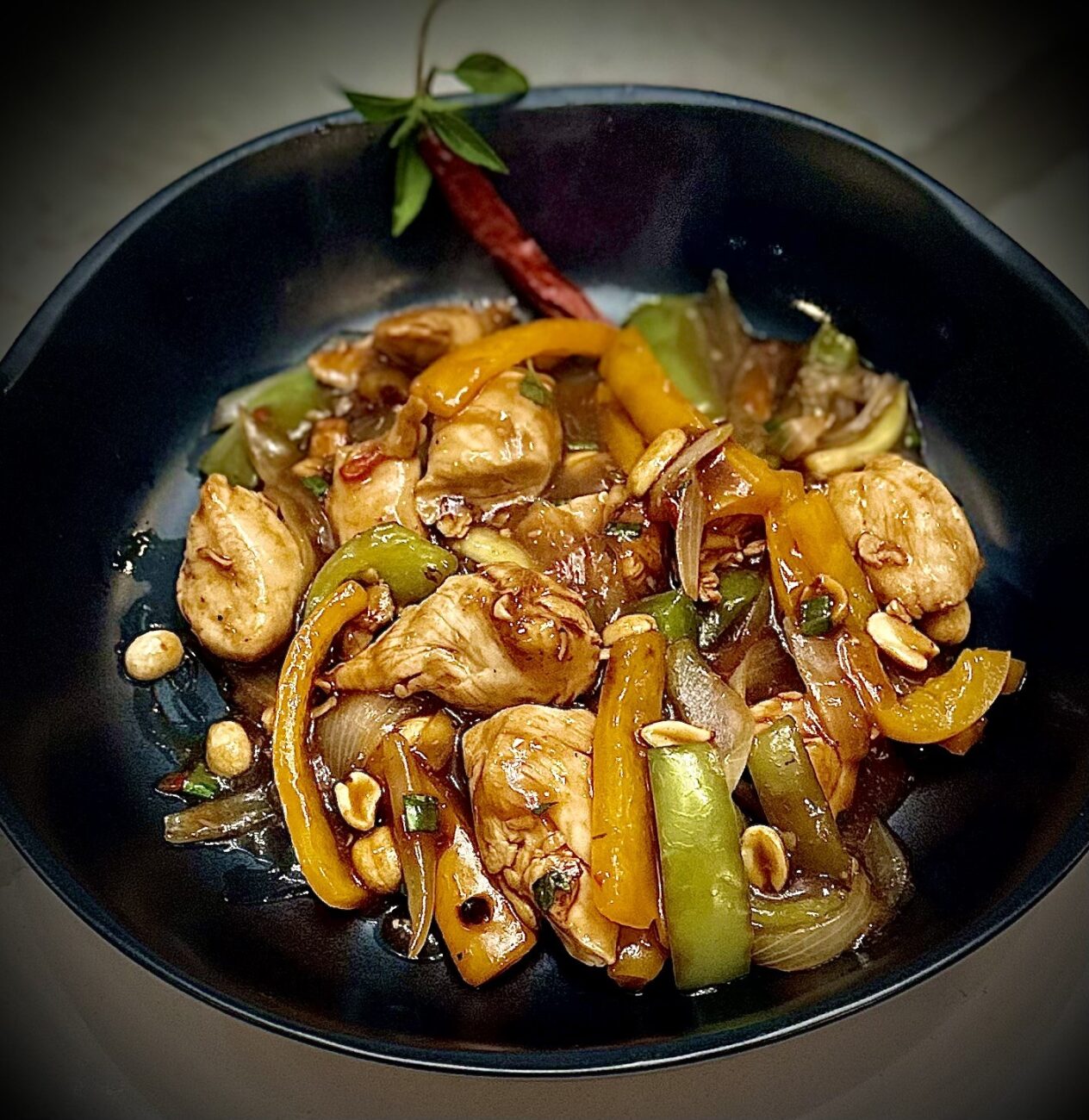 Spicy Kung Pao Chicken Stirfry mixed with Thai, Japonese, & Mexican Flavors