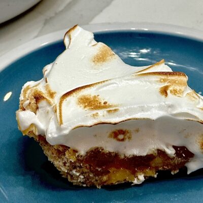 Plum pie with almond meringue crust and meringue topping recipe allison antalek