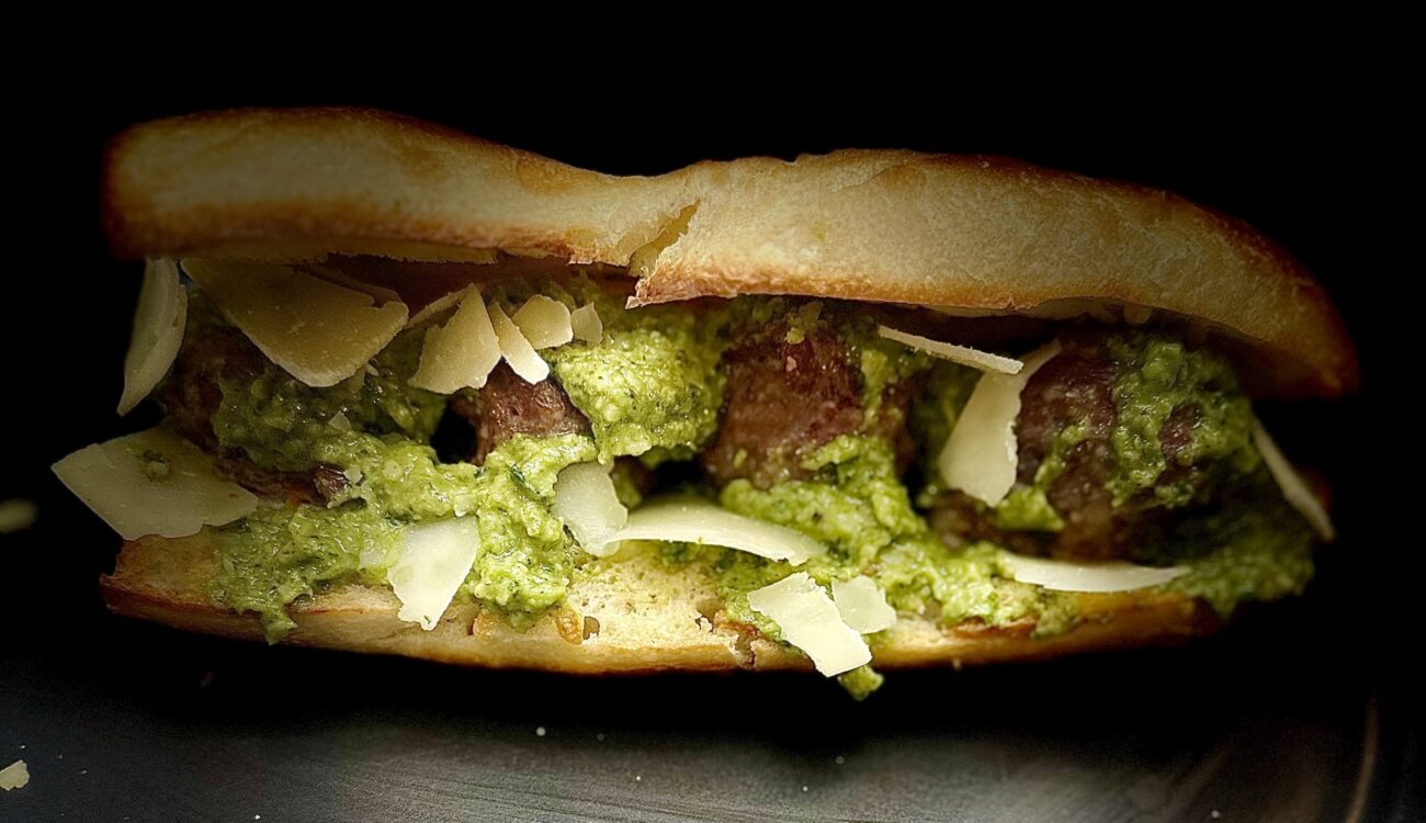 Over-the-Top Ricotta Meatball Sandwich with Arugula Walnut Pesto